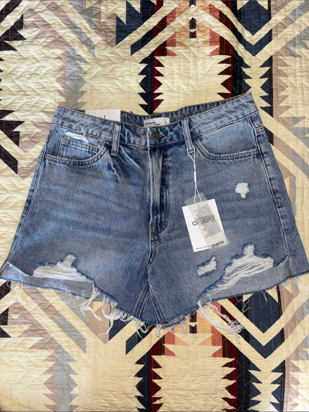 Oneso Distressed High-Rise Denim Shorts in Light Blue